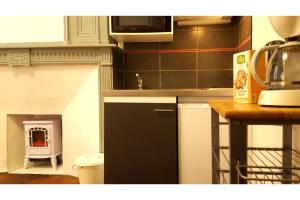Appartements La Maison bleue, un emplacement de choix a Rodez : photos des chambres