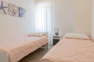 H11 CASA DEL SOLE Parcheggio - Vista mare