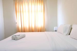 Spacious 2BR at Grand Asia Afrika Apartment By Travelio