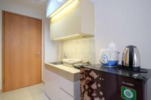 Best Deal and Homey Studio Evenciio Margonda Apartment By Travelio