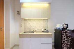 Best Deal and Homey Studio Evenciio Margonda Apartment By Travelio