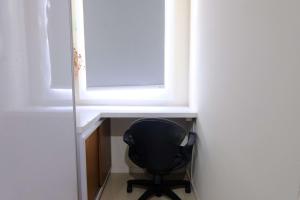 Modern Look 2BR at Apartment Parahyangan Residence By Travelio