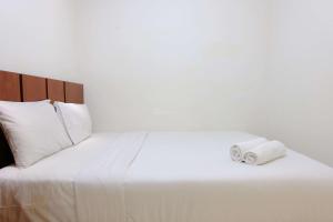 Homey and Modern Designed 2BR Apartment Parahyangan Residence by Travelio