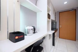 Good Location and Cozy Studio Margonda Residence 2 Apartment By Travelio