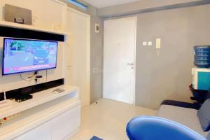 Best Strategic and Homey 2BR at Bassura City Apartment By Travelio