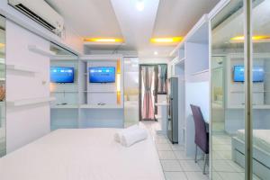 Good and Homey Studio at Kebagusan City Apartment By Travelio