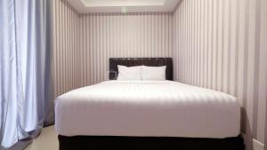 2 BR Apartment The Mansion Kemayoran Tower Emerald By Travelio