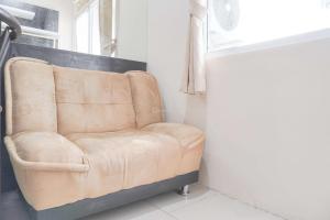 Cozy Stay 1BR at Green Pramuka City Apartment By Travelio