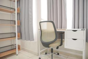 Homey and Minimalist 1BR Cinere Bellevue Suites Apartment By Travelio