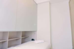 Comfort and Nice 2BR at Gold Coast Apartment By Travelio