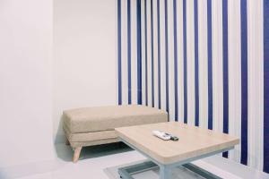 Homey and Warm 1BR at Sentraland Cengkareng Apartment By Travelio