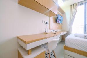 Good Choice and Strategic 2BR without Living Room Evenciio Apartment By Travelio