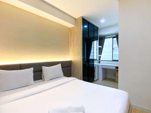 Good and Modern 2BR Daan Mogot City Apartment By Travelio