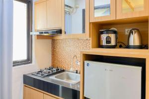 Cozy Living Studio at Kebagusan City Apartment By Travelio