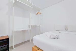Luxury Studio at 19th Floor Apartment Urbantown Serpong By Travelio
