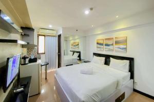 Comfortable Stay Studio at Kebagusan City Apartment By Travelio