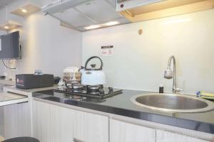 Well Designed and Cozy Studio at Bassura City Apartment By Travelio