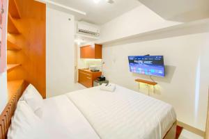 Good and Homey Studio at Tokyo Riverside PIK 2 Apartment By Travelio