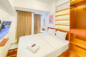 Good and Homey Studio at Tokyo Riverside PIK 2 Apartment By Travelio