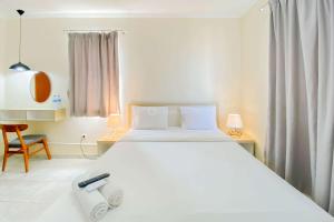 Good and Cozy Studio (Free IPL & Utilities) Grand Palace Kemayoran Apartment By Travelio