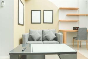 Studio Loft No Kitchen Mezzanine at Kubikahomy Apartment By Travelio