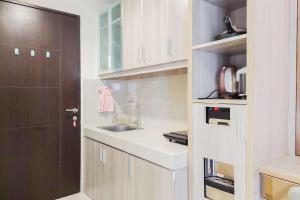 Homey and Comfort Stay Studio Atria Residences Gading Serpong Apartment By Travelio
