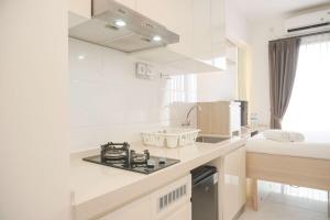 Best Choice and Nice Studio at Sky House BSD Apartment By Travelio