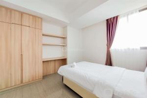 Spacious and Homey 3BR at Hillcrest House Apartment By Travelio