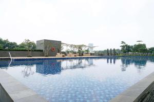 Strategic and Warm Studio at Ciputra International Apartment By Travelio