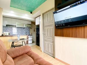 Best Deal and Homey 1BR Apartment Grand Sentraland Karawang By Travelio