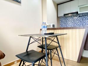 Best Deal and Homey 1BR Apartment Grand Sentraland Karawang By Travelio