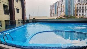 Nice Studio at 18th Floor Atria Residence Gading Serpong Apartment By Travelio