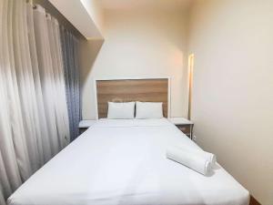 Comfortable and Homey 1BR at Uttara The Icon Apartment By Travelio