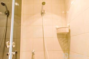 Simple and Cozy Living Studio Room at Poris 88 Apartment By Travelio