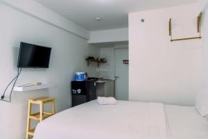 Elegant and Comfortable Studio at Urbantown Serpong Apartment By Travelio