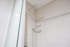 Modern and Comfort Stay 2BR at Ciputra International Apartment By Travelio