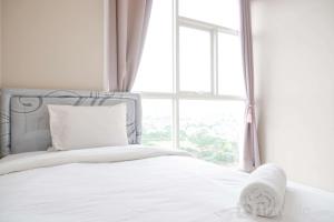 Modern and Comfort Stay 2BR at Ciputra International Apartment By Travelio