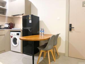 Modern Design 1BR Menara Jakarta Kemayoran Apartment By Travelio