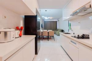 Homey and Spacious 3BR Sky House BSD Apartment By Travelio