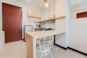 Modern Look 1BR at Asatti Apartment By Travelio
