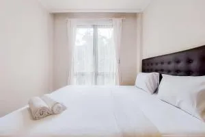 Modern Look 1BR at Asatti Apartment By Travelio - Legok