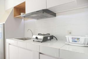 Simply Look Studio at Casa De Parco Apartment By Travelio