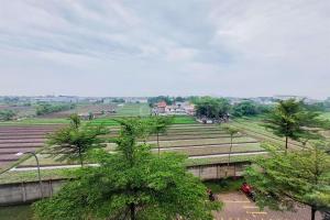 Cozy Stay Studio Apartment at Aeropolis Residence By Travelio