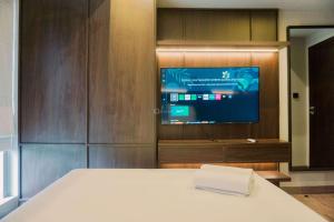 Spacious 1BR with Extra Room Branz BSD City Apartment By Travelio