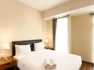 Comfortable and Strategic 1BR at Vasanta Innopark Apartment By Travelio - Cibuntu