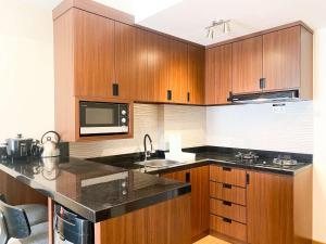 Comfortable and Strategic 1BR at Vasanta Innopark Apartment By Travelio