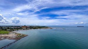 Spacious 2BR at Delft Ciputra Makassar Apartment By Travelio