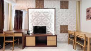 Spacious 2BR at Delft Ciputra Makassar Apartment By Travelio