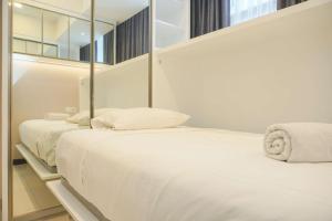 Best Spacious and Nice 3BR at 28th Floor Casa Grande Apartment By Travelio