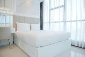 Best Spacious and Nice 3BR at 28th Floor Casa Grande Apartment By Travelio
